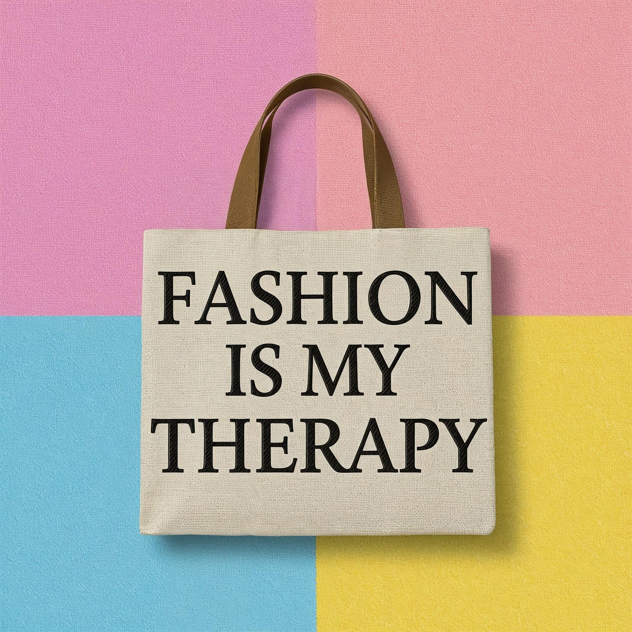 Tote bag with text “FASHION IS MY THERAPY” centered on pastel color blocks in pink, blue, yellow, and purple